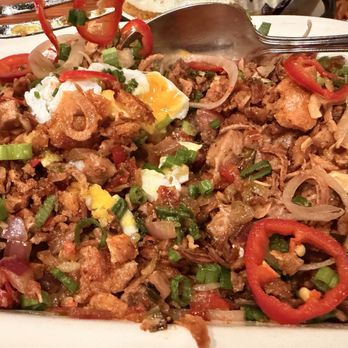 Kuya Lord - One of the best I've ever had! Lucenachon sisig: rice is under this, and I was hungry and broke the egg before remembering to take a pic. - Barbeque Near Me - Los Angeles, California Kuya Lord - One of the best I've ever had! Lucenachon sisig: rice is under this, and I was hungry and broke the egg before remembering to take a pic. - Barbeque Near Me - Los Angeles, California