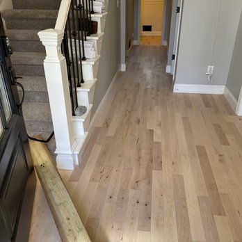 MSCS - a view of a hallway with stairs and railings - Flooring Near Me - Roswell, Georgia
