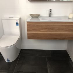 Bridgewater Plumbing - Floating vanity units and wall faced toilets make the pipework "disappear"