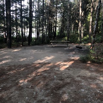 Penobscot Outdoor Center - Campsite with picnic table and fire ring, and lake in the background - Campgrounds Near Me - Millinocket, Maine Penobscot Outdoor Center - Campsite with picnic table and fire ring, and lake in the background - Campgrounds Near Me - Millinocket, Maine