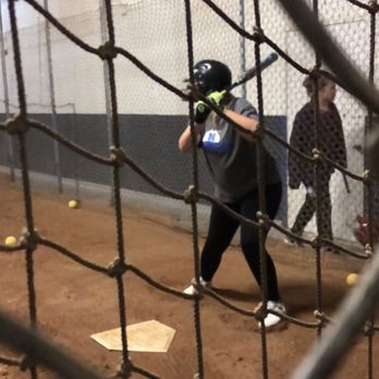 Inland Indoor Batting Cages - My daughter batting - Sporting Goods Near Me - Riverside, California Inland Indoor Batting Cages - My daughter batting - Sporting Goods Near Me - Riverside, California