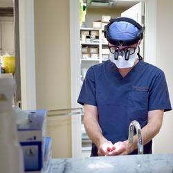 Dr. Derek Ford - Dr. Derek Ford washing his hands before a procedure