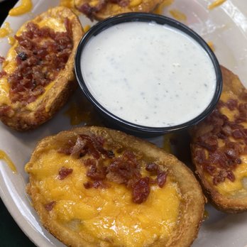 Grins Restaurant - 1/2 order potato skins - American Near Me - San Marcos, Texas Grins Restaurant - 1/2 order potato skins - American Near Me - San Marcos, Texas
