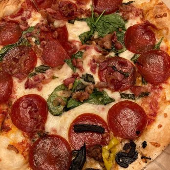 Pieology Pizzeria - My brother's pizza: he only got 3/5 toppings he wanted AND there are burnt pieces of something on one of the slices! - Pizza Near Me - Walnut, California Pieology Pizzeria - My brother's pizza: he only got 3/5 toppings he wanted AND there are burnt pieces of something on one of the slices! - Pizza Near Me - Walnut, California