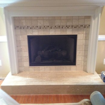 Sykes Remodeling Services - Went from brick to this marble tiled. - General Contractors Near Me Sykes Remodeling Services - Went from brick to this marble tiled. - General Contractors Near Me