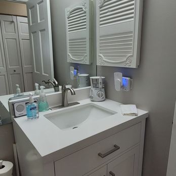 Global Home Improvement - New vanity installed in the guest bathroom - General Contractors Near Me
