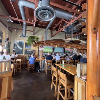 Islands Restaurant - people sitting at tables in a restaurant - Burgers Near Me - Torrance, California Islands Restaurant - people sitting at tables in a restaurant - Burgers Near Me - Torrance, California