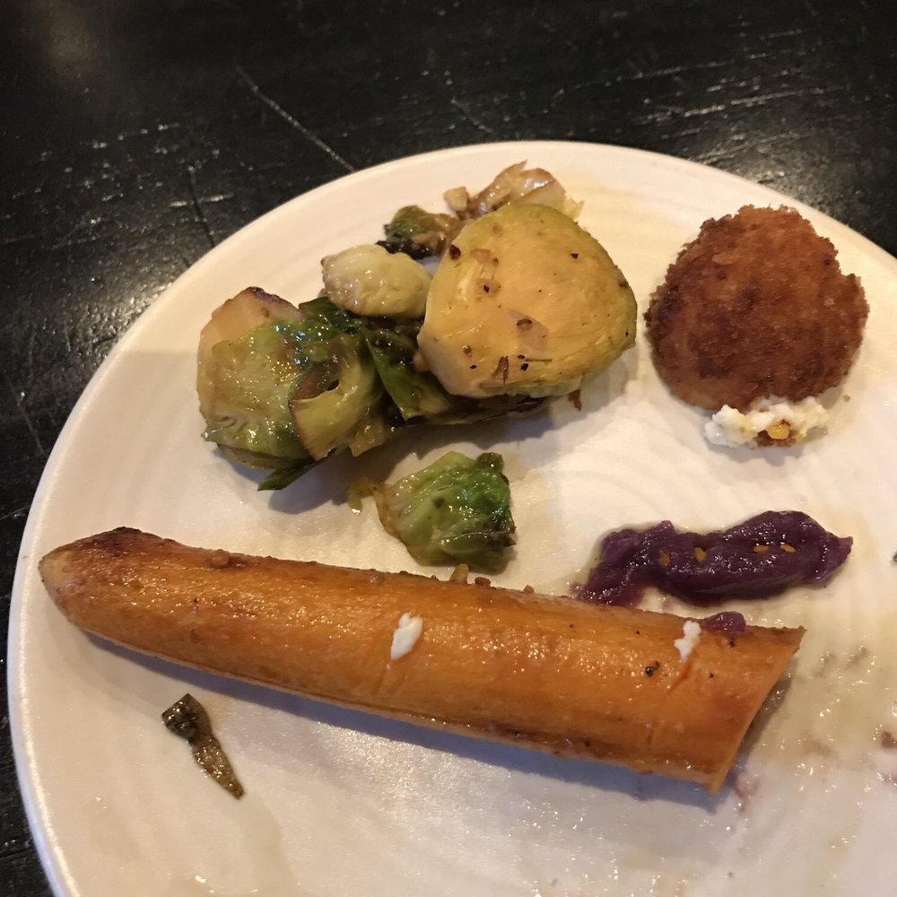 The Commoner - We shared appetizers so here's a carrot with sweet potato paste and some Brussels sprouts with a goat cheese ball. - New American Near Me - Pittsburgh, Pennsylvania The Commoner - We shared appetizers so here's a carrot with sweet potato paste and some Brussels sprouts with a goat cheese ball. - New American Near Me - Pittsburgh, Pennsylvania
