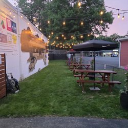 Enjoy our outdoor seating area, corn hole and connect four included!