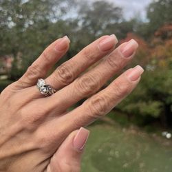 Town Center Nails & Hair Salon - I always keep it natural with a sheer gel coat, but they're great at anything you want. Narrow, square.