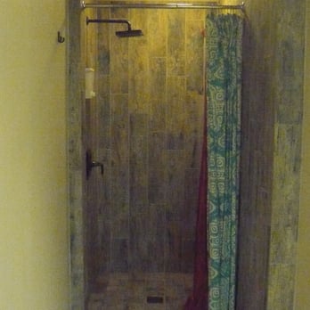 Hot Yoga Plus - Men's shower (1 of 2). - Yoga Near Me - San Mateo, California Hot Yoga Plus - Men's shower (1 of 2). - Yoga Near Me - San Mateo, California
