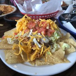 Nachos made out of the ingredients from the taco party