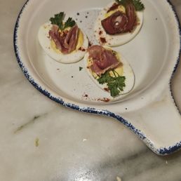 Deviled eggs with prosciutto.
