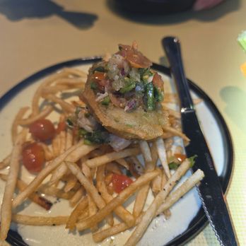 Bootsies - Fried avocado & shrimp in a tasty jalapeño cream sauce. - Italian Near Me - Manhattan, Kansas Bootsies - Fried avocado & shrimp in a tasty jalapeño cream sauce. - Italian Near Me - Manhattan, Kansas