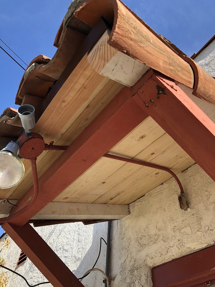 Slide of Eric's Roofing