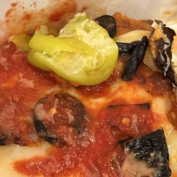 Detroit Square Pizza - Oh look, a chunk of peoperoncini that must be the hefty weight of the "everything" because there was nothing else on the slices. - Pizza Near Me - San Francisco, California
