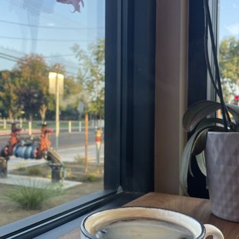 Rise N Brew - a cup of coffee on a saucer - Coffee & Tea Near Me - Turlock, California Rise N Brew - a cup of coffee on a saucer - Coffee & Tea Near Me - Turlock, California