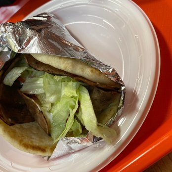 Sultan's Deli - An Original Gyro Sandwich, the Siracha Chicken Gyro Sandwich was my favorite!!! I ate it before taking the picture. - Mediterranean Near Me - Apex, North Carolina