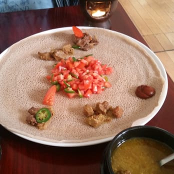 Ethiopic - This is how you can share your main dish with others or just divide the plate in half and keep them separate! - Ethiopian Near Me - Washington, DC, District of Columbia Ethiopic - This is how you can share your main dish with others or just divide the plate in half and keep them separate! - Ethiopian Near Me - Washington, DC, District of Columbia