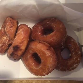 Caywood And Randazzo's Bakery - Look how sloppy they put the doughnuts  in the box and the worse part is that they where chocolate covered face down - Bakeries Near Me - Chalmette, Louisiana