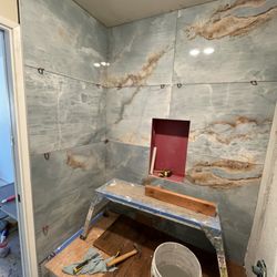 Tile Craft - Bathtub Tile installation with shampoo niche with large format tiles