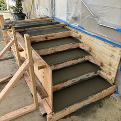 Merriman's - Framing and cement work creating a new landing and steps for access to our laundry room