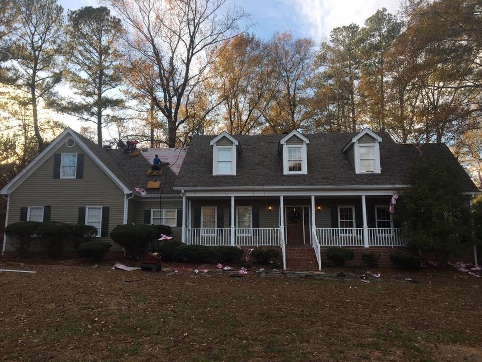 Slide of Rainblocker Roofing & Construction