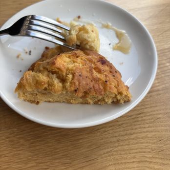Tupelo Honey - Half of sweet potatoes biscuit, original was quick to disappear - New American Near Me - Lenexa, Kansas