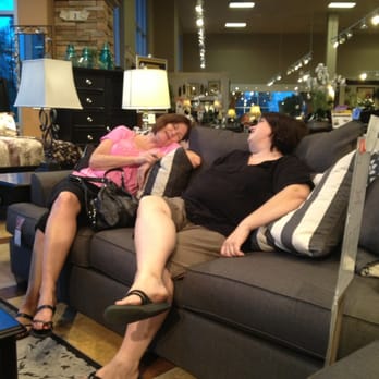 Ashley Store - Taking a load off after they found what they were looking for. - Furniture Stores Near Me - Colton, California Ashley Store - Taking a load off after they found what they were looking for. - Furniture Stores Near Me - Colton, California