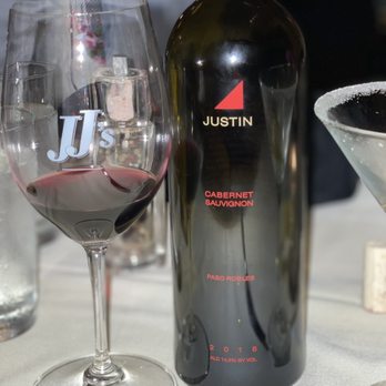 JJ's Restaurant - a glass of wine and a bottle of wine - Seafood Near Me - Kansas City, Missouri JJ's Restaurant - a glass of wine and a bottle of wine - Seafood Near Me - Kansas City, Missouri