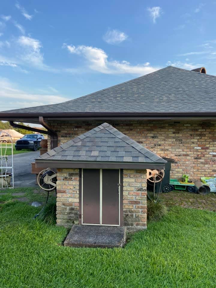 Slide of John Theriots Roofing