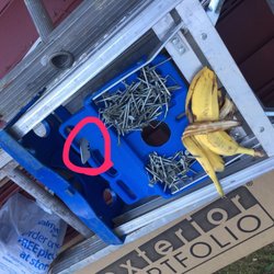 Champion Windows & Home Exteriors of Richmond - Nails and a razor blade for me to pick up so my kids and pets wouldn't get hurt. The banana peel was a nice touch too.