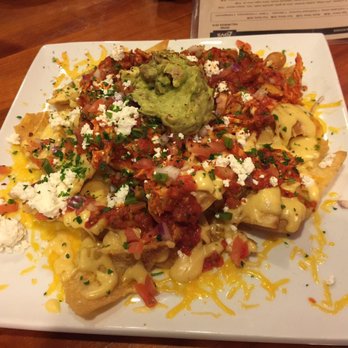 Zovs - Chicken nachos!!! Looks ordinary but this was EXTRA-ordinary!!!! 5 stars!! - New American Near Me - Irvine, California Zovs - Chicken nachos!!! Looks ordinary but this was EXTRA-ordinary!!!! 5 stars!! - New American Near Me - Irvine, California
