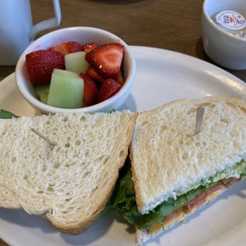 McDuff's - Tuna sandwich on sourdough with a side of fruit. - Breakfast & Brunch Near Me - Redlands, California