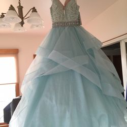 Carole's Alterations - Shortened length of prom dress.