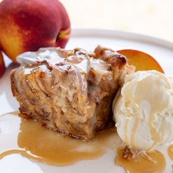 Tipsy Cow Ice Cream and Desserts - Cinnamon Roll Bread Pudding. This seasonal flavor was made with local peaches from a neighbor