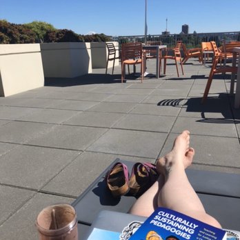 Square One Apartments - Rooftop deck with views of Rainer, UW tower, space needle, and both mountain ranges. Nice place to work from home during the warmer months. - Apartments Near Me - Seattle, Washington