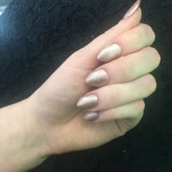 One Stop Nail Shop - Booked an appt. with Justin, He fixed them perfectly and knew exactly which shape I wanted. I chose this gorgeous shimmery Rose Gold swatch!