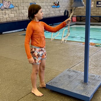 Callan Swim School - Your kiddo gets to ring the bell when they've mastered a lesson/stroke. Everyone cheers! It's so fun for them. - Swimming Lessons/Schools Near Me - San Marcos, California Callan Swim School - Your kiddo gets to ring the bell when they've mastered a lesson/stroke. Everyone cheers! It's so fun for them. - Swimming Lessons/Schools Near Me - San Marcos, California