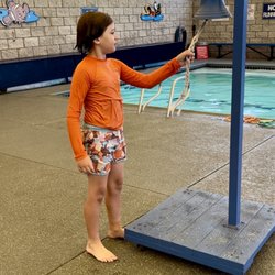 Callan Swim School - Your kiddo gets to ring the bell when they've mastered a lesson/stroke. Everyone cheers! It's so fun for them.