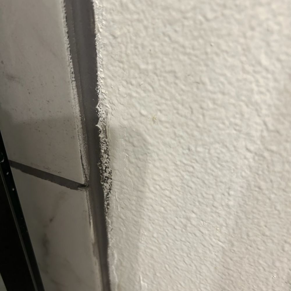 Handy - Master shower finished grout job. No trim around the outside tile of shower either. - Handyman Near Me Handy - Master shower finished grout job. No trim around the outside tile of shower either. - Handyman Near Me