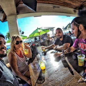 Shephard's Tiki Beach Bar - sitting at table - American Near Me - Clearwater, Florida Shephard's Tiki Beach Bar - sitting at table - American Near Me - Clearwater, Florida
