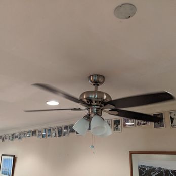 JAMnB Water and Electric - a ceiling fan in a living room - General Contractors Near Me
