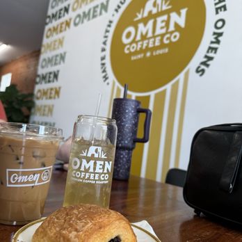 Omen Coffee Company - Dirty iced chai latte with oat milk and a pump of lavender, chocolate croissant, plus a iced Moroccan mint tea - Coffee Roasteries Near Me - St. Louis, Missouri Omen Coffee Company - Dirty iced chai latte with oat milk and a pump of lavender, chocolate croissant, plus a iced Moroccan mint tea - Coffee Roasteries Near Me - St. Louis, Missouri