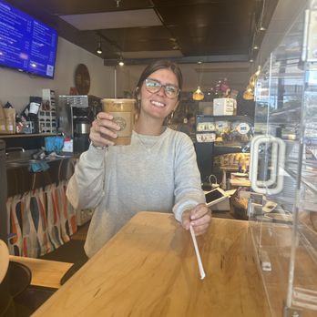 Brass Key Coffee - The cutest barista ever holding my iced vanilla late with almond milk - Coffee & Tea Near Me - Alexandria, Kentucky