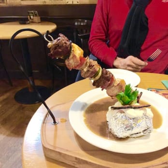 Demínka - Grilled skewer sample with baked potato and garlic drizzle. (Beef sirloin, pork tenderloin, chicken breast) - Czech Near Me - Prague, Puerto Rico Demínka - Grilled skewer sample with baked potato and garlic drizzle. (Beef sirloin, pork tenderloin, chicken breast) - Czech Near Me - Prague, Puerto Rico