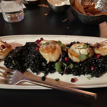 PIAF KITCHEN + WINE + BAR - Scallops with Sea Scallop and Squid Ink Risotto Dinner- risotto not recommended. - Mediterranean Near Me - Grapevine, Texas PIAF KITCHEN + WINE + BAR - Scallops with Sea Scallop and Squid Ink Risotto Dinner- risotto not recommended. - Mediterranean Near Me - Grapevine, Texas