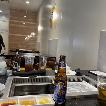 100°C Grill & Hotpot - a bottle of beer on the counter - Hot Pot Near Me - Tulsa, Oklahoma