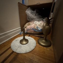 Broken Anthropologie side table in fro front the box it was stuck in. Broken Anthropologie side table in fro front the box it was stuck in.