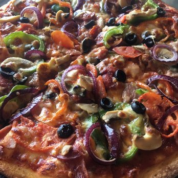 Bellissima Deli House - Bellissima wood fired pizza - thin crust - Italian Near Me - Angeles, PAM